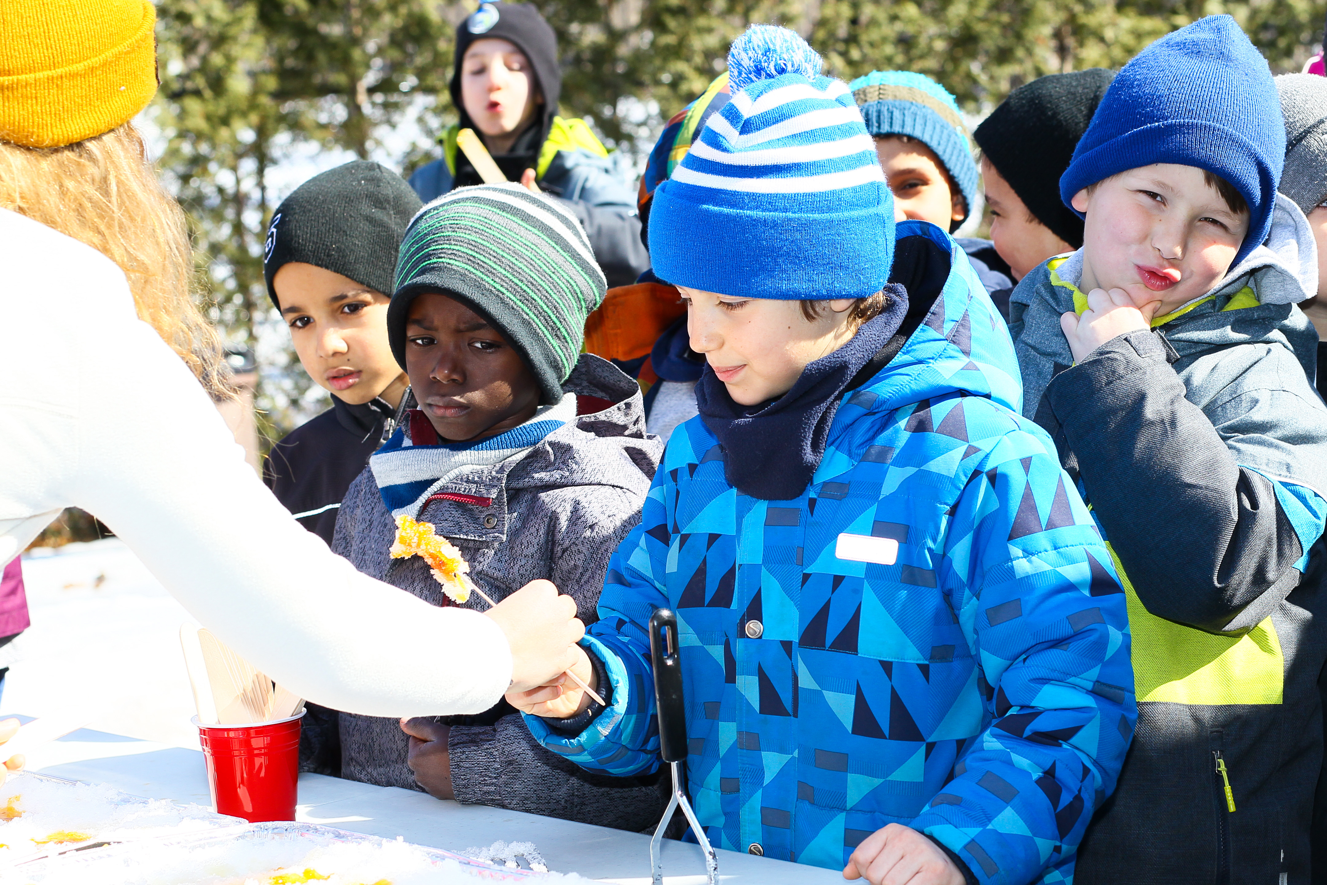 Goûter la tire pour la première fois